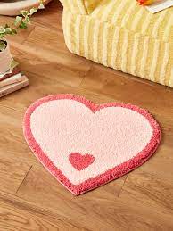contrasting binding heart shaped rug