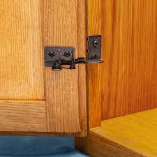 snap closing semi concealed hinges for