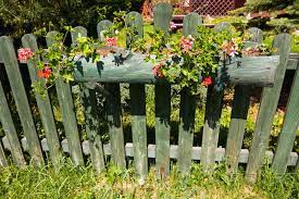 It's the perfect amount of natural wood and greenery against the red shingled siding and concrete steps. 45 Beautiful Fence Planters Decorate Your Garden Fence Designing Idea