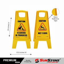 vertical yellow wet floor safety sign