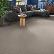 The carpet is trimmed to a precise fit as the carpet is stretched with special tools. Flooring Carpets Rugs Glasswells Bury St Edmunds Ipswich