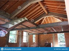 red brick and exposed beams stock photo