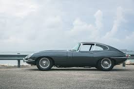 Maybe you would like to learn more about one of these? 1965 Jaguar E Type Fhc Touring Curated