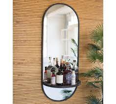 elora oval wall mirror with shelf