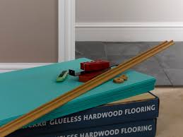 laying wood and laminate floors