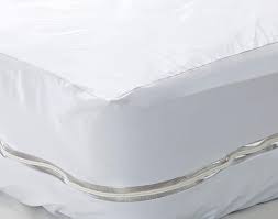 The waterproof zipper completely locks out allergens and dust mites, ensuring the best allergy protection available. Full White Pile Of Pillows Bed Bug And Allergen Proof Mattress Encasement