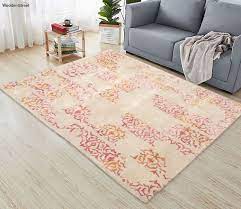 beige and pink hand tufted foliage rug