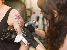 everything to know about tattooing over