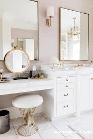 makeup vanity with white and gold stool