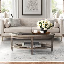 The oval shape looks modern and you can put your tea cups, flowers and books on the first shelf, the second sturdy & durable structure: Kelly Clarkson Home Clemence Coffee Table With Storage Reviews Wayfair