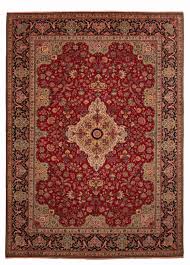 red tabriz rug with alabaf signature