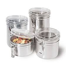 This is a set of 4 kitchen canisters with copper lids from the 1970's. Oggi 4 Pc Stainless Steel Locking Kitchen Canister Set With Spoons
