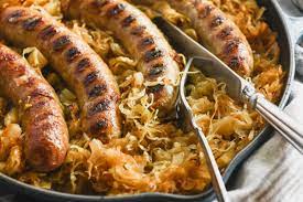 baked brats in caramelized sauer