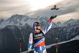 © samo vidic/red bull content pool. Ski Alexis Pinturault And Drone On Giant Slalom Piste