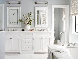 The ceiling compliments the sparkling white tile flooring and the matching white tub and cabinets. 21 White Bathroom Ideas For A Sparkling Space Better Homes Gardens