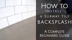 how to install a subway tile backsplash