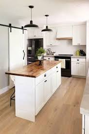 White Kitchen With Concrete Countertops