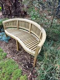 teak outdoor bench seat and two