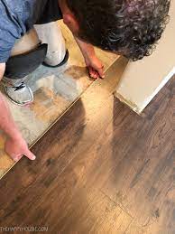 install vinyl plank over tile floors