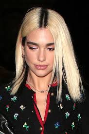 I was born with blonde hair — specifically an ashy blonde with a penchant for turning almost dying my hair every few weeks was exhausting. How To Style Grown Out Roots Celebrities With Dark Roots Glamour Uk