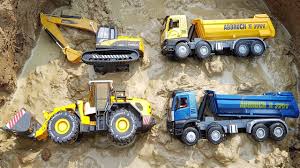 If your little one is anything like mine, they may be able to say and identify an excavator from a bulldozer before they are 2 years old. Fine Toys Construction Vehicles Under The Mud Excavator Road Roller Construction Vehicles Vehicles Toys