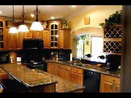 honey oak kitchen cabinets with granite