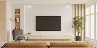 white wall mounted tv on cabinet in