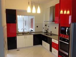 Painting cabinets or walls is an easy way to makeover your kitchen, but we love the idea of swapping out old countertops with bright red ones, like in this kitchen spotted on pinterest. Kitchen Cabinet At Bukit Antarabangsa Ampang Red Black White Acrylic Material Door Red And White Kitchen Cabinets Kitchen Cabinets Modern Kitchen Interiors