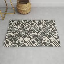 video game controllers in grey rug by