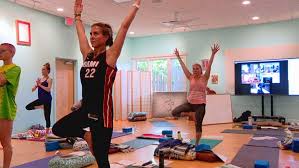 asheville yoga studios shine light on