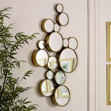 Our frameless mirrors are available in four different shapes. Gold Multi Circle Wall Mirror 61cm X 103cm