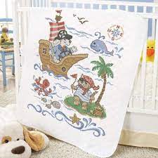 I need to trim these down with the rotary cutter, and then it'll be ready to sew together. Baby By Herrschners Pre Quilted Pirate Voyage Baby Quilt Stamped Cross Stitch Kit Disney Cross Stitch Kits Baby Quilts Pirate Quilt