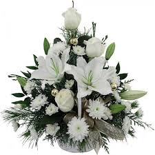 Bigliettini in memoria della ballerina milanese scomparsa a 84 anni Arrangement Of All White Flowers Lilies Chrysanthemums Roses Wrapped With Decorative Greenery
