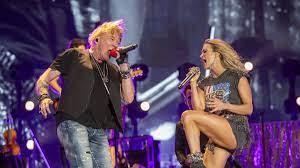 Carrie Underwood brings bombast, and ...