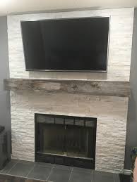 Stacked Stone Fireplace With Reclaimed