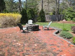 Red Brick Patio With A Fire Pit
