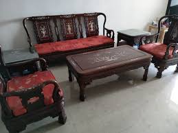 wooden sofa set with cushions