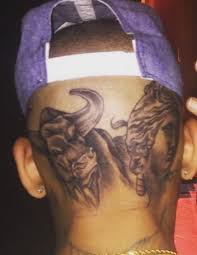 Chris brown has a new neck tattoo that bears an overwhelming resemblance to the widely circulated police photo taken of rihanna after he viciously assaulted her in 2009. Chris Brown S 26 Tattoos Their Meanings Body Art Guru