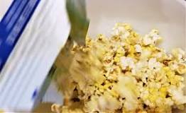 What happens if you reheat popcorn?