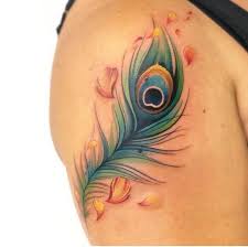 Usually, you can see a mix of realism, splashes of red and some surrealism in the tattoo. 29 Beautiful Peacock Tattoo Designs The Xo Factor