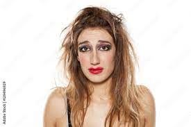 sad beautiful woman with bad makeup and