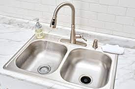 replacing a drop in surface mounted sink