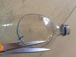a magnifying gl with a plastic bottle