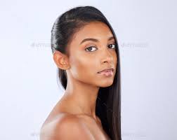 indian woman hair care or makeup in