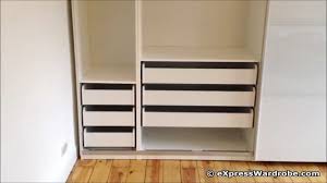 Sauder homeplus wardrobe, dakota oak finish. Ikea Pax Tonnes Sliding Door Wardrobe Design Youtube