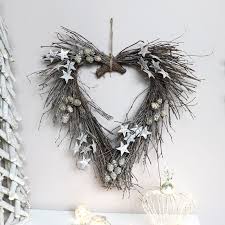 large twig wall heart with stars amp