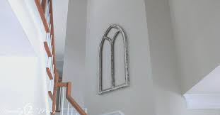 How To Style A Tall Staircase Wall The
