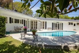 Elvis pool house door photo. Priscilla Presley Lists Brentwood Family Home For 3 65 Million Architectural Digest