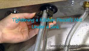 to tighten a kitchen faucet nut under