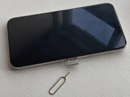 If the tray is stuck take a really thin paper clip and a pair of pliers and make a little hook that will still thread through the hole but you can angle it to catch on the back side and try to pull the sim tray out manually. How To Remove The Sim Card From An Iphone Or Cellular Ipad Macrumors